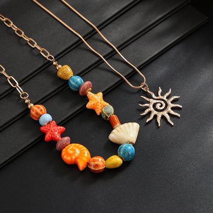 Ingemark 2 Pcs/Set Hip Hop Colorful Ceramic Sea Star Conch Bead Choker Necklace for Men Punk Retro Spiral Sun Pendant Necklaces